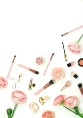 Makeup cosmetic accessories products  top view brushes, lipstick, pink flowers ranunkulus  on white background. Flat lay. Copy space