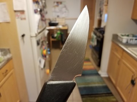 Sharp Metal Knife In Kitchen First Person Perspective