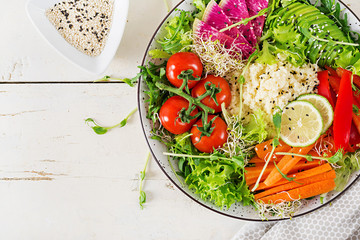 Couscous and vegetables bowl.  Trend food. Healthy, diet, vegetarian food concept on a light background . Vegan buddha bowl. Top view