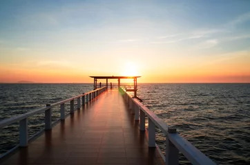 Foto auf Acrylglas Landscape of bridge in sea on tropical beach and sunset sky background . © oatautta