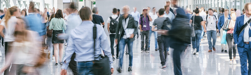 large crowd of anonymous blurred people