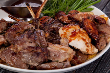 juicy and appetizing steak tamogavok of horse meat on the table, for design in cooking	