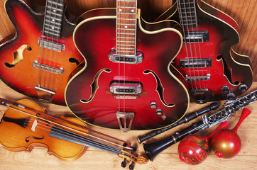 Plakat Three electric guitars, violin, maracas, djembe