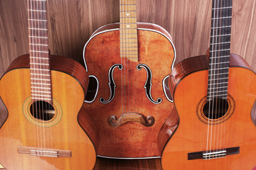 Fototapeta na wymiar Three vintage acoustic guitars.