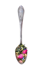 spoon with blending tea isolated on a white. gren tea