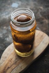 Pickled lemon on rustic background