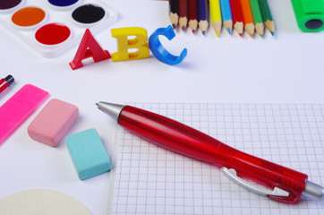 School office supplies on white