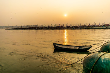 Fototapeta premium Kumbha Mela, Allahabad, Uttar Pradesh, India; 17-Feb-2019; a sunset view of river Ganges,Triveni Sangam, Prayag