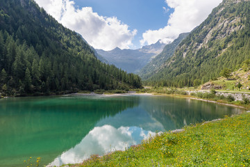 Naklejka na ściany i meble Mountain lake on the alps in summer, Macugnaga and lake delle Fate, Italy