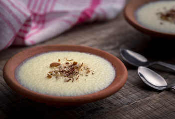 phirni - sweet rice pudding - traditional punjabi sweet dish in earthen plate