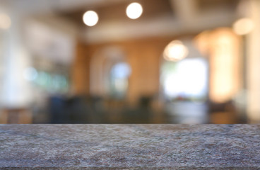 Empty marble stone table in front of abstract blurred background of restaurant, cafe and coffee shop interior. can be used for display or montage your products - Image.