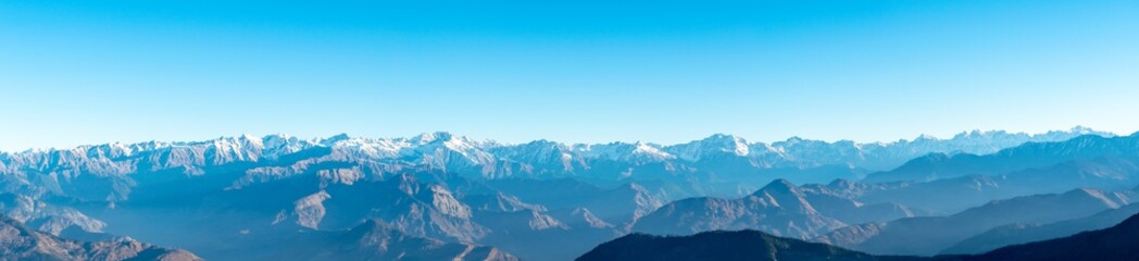 Fototapeta na wymiar Shivalik Range of the Himalayas, Narkanda Valley, Himachal Pradesh- a panoramic view of the Shivalik Range taken from Hatu Peak
