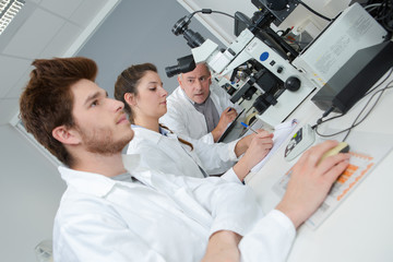young scientists working on research dates in the laboratory