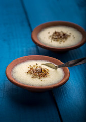 phirni - sweet rice pudding - traditional punjabi sweet dish in earthen plate