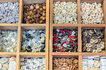 Assortment of colorful ceramic buttons and beads for making handmade accesories.