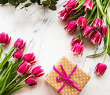 Pink spring tulips and gift box