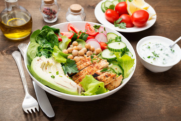 Salad with chicken meat. Fresh vegetable salad with chicken breast.