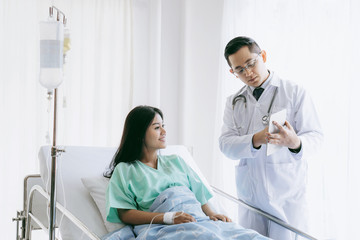 Fototapeta premium Doctors Inform health examination results to encourage patients in the hospital- medical concept