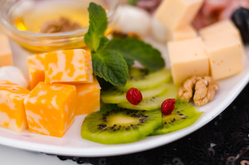 a plate filled with food on the table