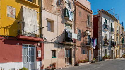 the popular neighborhood of Santa Cruz, next to the Castillo de Santa Barbara, in Alicante, Spain