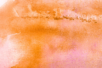orange watercolor blot on white background