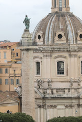 Trajan column and the dome of the church of the most holy name o