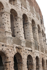 Detail of the Roman Colosseum in Italy in Rome with arches and m
