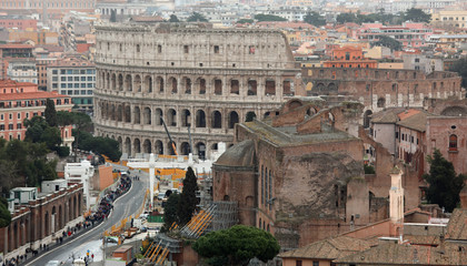 Fototapeta na wymiar colosseum and via dei Imperial Fora seen from above in Rome Ital