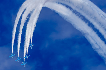 five plains in the blue sky