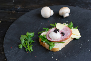 Children's sandwich made in the form of a dog. Option of children's serving