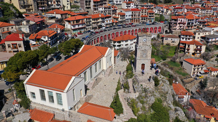 Fototapeta na wymiar Aerial drone photo from famous and picturesque village of Arachova built on the slope of Parnassus mountain with traditional character at spring, Voiotia, Greece