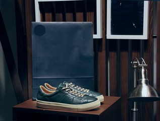 Background with shoes on shelves of shop
