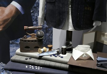 Men sweaters and shirts in a store in