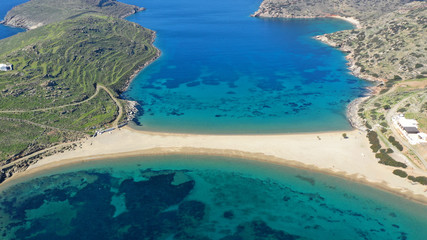 Fototapeta na wymiar Aerial drone panoramic photo of iconic two sided sandy tropical turquoise sea paradise beach of Kolones near Fykiada in island of Kythnos at spring, Cyclades, Greece