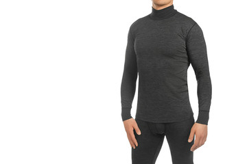 Man in thermal underwear for active winter sport. Man wearing Thermolinen isolated on white background. T-shirt with long sleeves and leggings