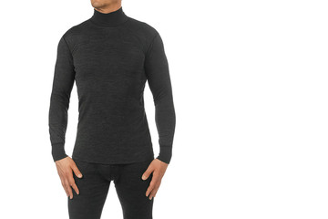 Man in thermal underwear for active winter sport. Man wearing Thermolinen isolated on white background. T-shirt with long sleeves and leggings