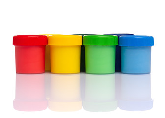 Set of Colorful Gouache jars isolated on white background with copy space. Cans of different colors gouache paints.