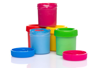 Set of Colorful Gouache jars isolated on white background with copy space. Cans of different colors...