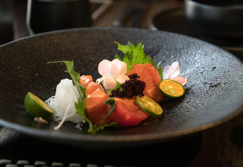 Salmon sashimi fresh and raw salmon fish slice ready to serve in Japanese food style.