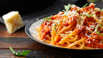 Spaghetti alla Amatriciana with pancetta bacon, tomatoes and pecorino cheese - obrazy, fototapety, plakaty