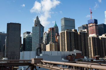 Obraz premium The skyline of Manhattan, New York seen from the Brooklyn Bridge