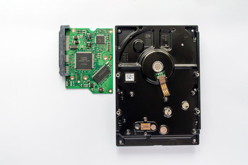 the disassembled hard disk of the computer