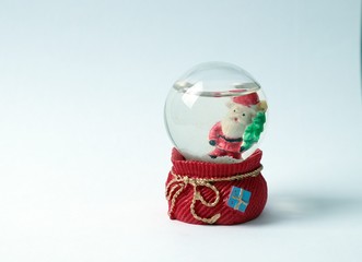 New Year snow globes on white background.