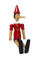 January 10, 2019 - Rome, Italy - Pinocchio, the wooden puppet, isolated on white background. From the Italian tale of Collodi. The nose grows when it says lies. Long nose. Traditional toy for children