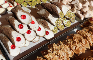 desserts called Sicilian cannoli in Italian language for sale in