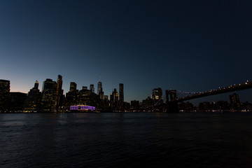 Fototapeta na wymiar Sunset over Manhattan seen from Brooklyn Hights across the East river.