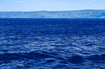 Fototapeta na wymiar Blue sea waves ocean coastline view