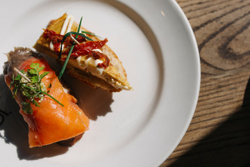 salmon appetizer and potato omelet