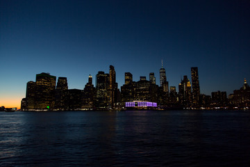 Fototapeta na wymiar Sunset over Manhattan seen from Brooklyn Hights across the East river.