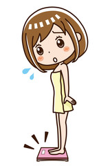 体重計に乗る女性